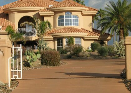 Desert home with garage door and palm trees in Palm Springs Southern California